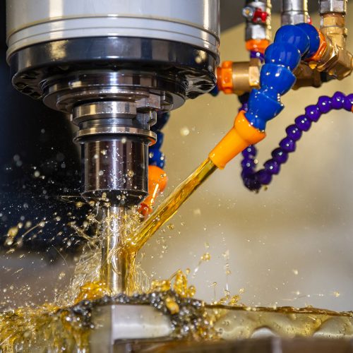 The CNC milling machine rough cutting the mould part with indexable radius endmill tool. The mold and die manufacturing process with machining center by oil coolant method.